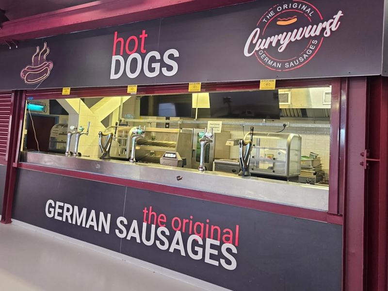 The Currywurst branded kiosk residency at a venue